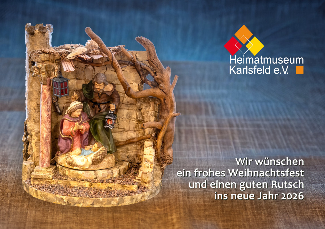 Krippe mit den besten W&uuml;nschen f&uuml;r Weihnachten und einen guten Rutsch ins neue Jahr 2026